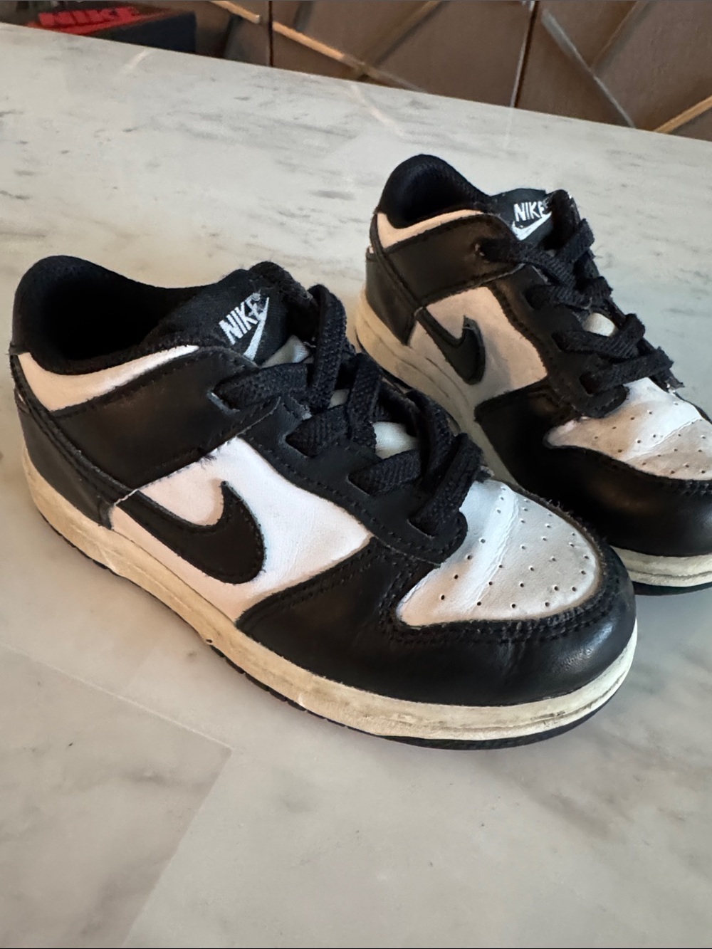 Nike Kids Black and White Low-Top Sneakers with Swoosh